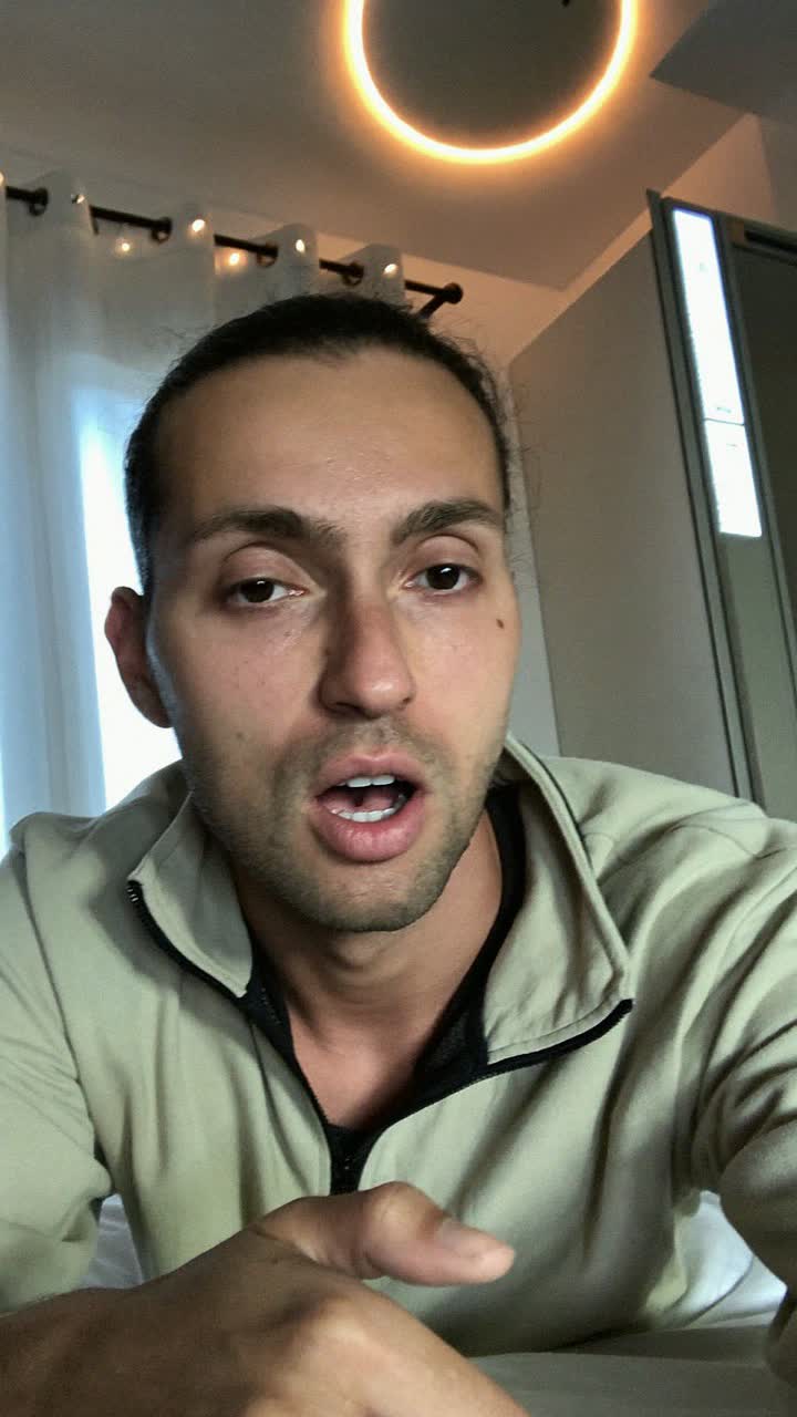 Omar, 33-year-old Lebanese man, slicked-back hair, wearing a quarter-zip pullover
