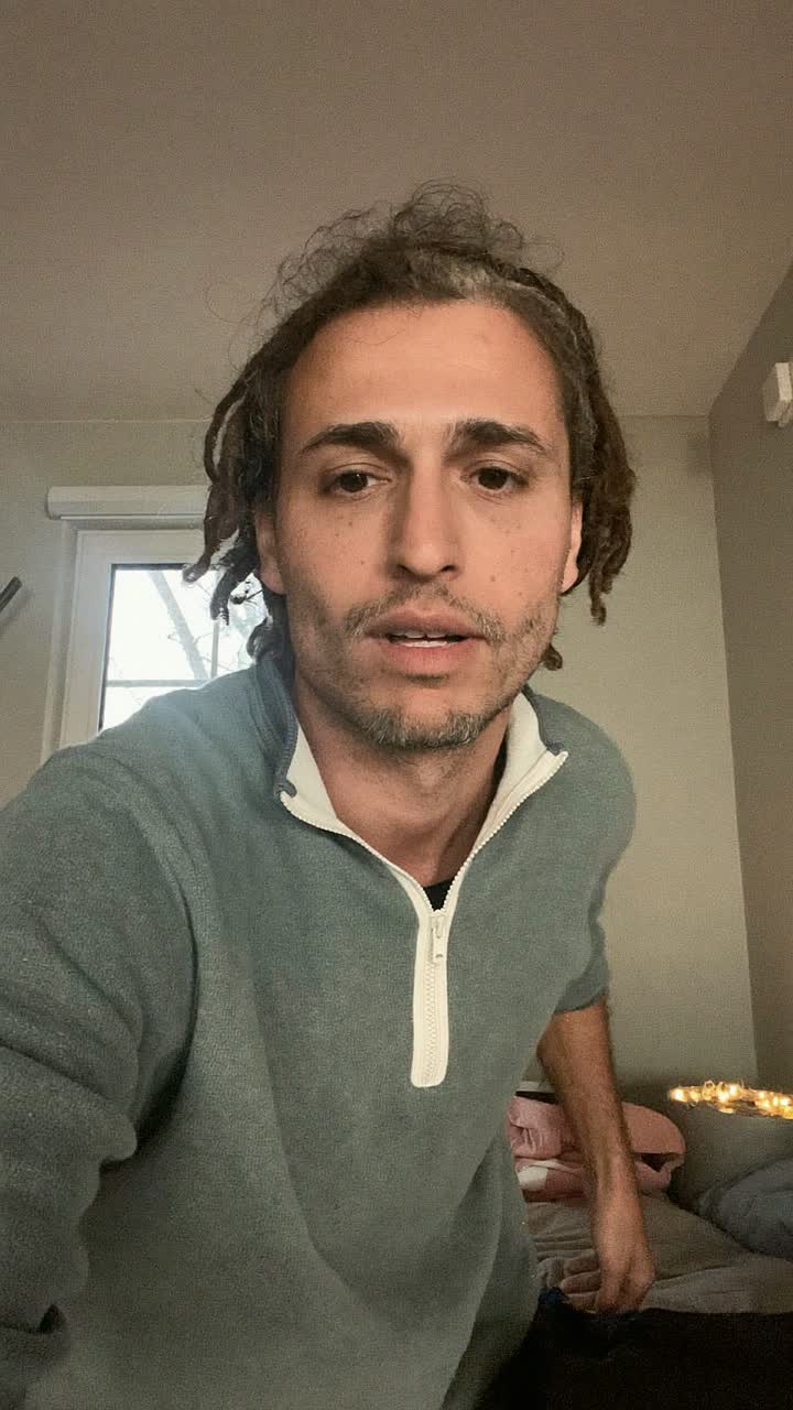 Pavel, 41-year-old Eastern European man, short twists, wearing a quarter-zip pullover